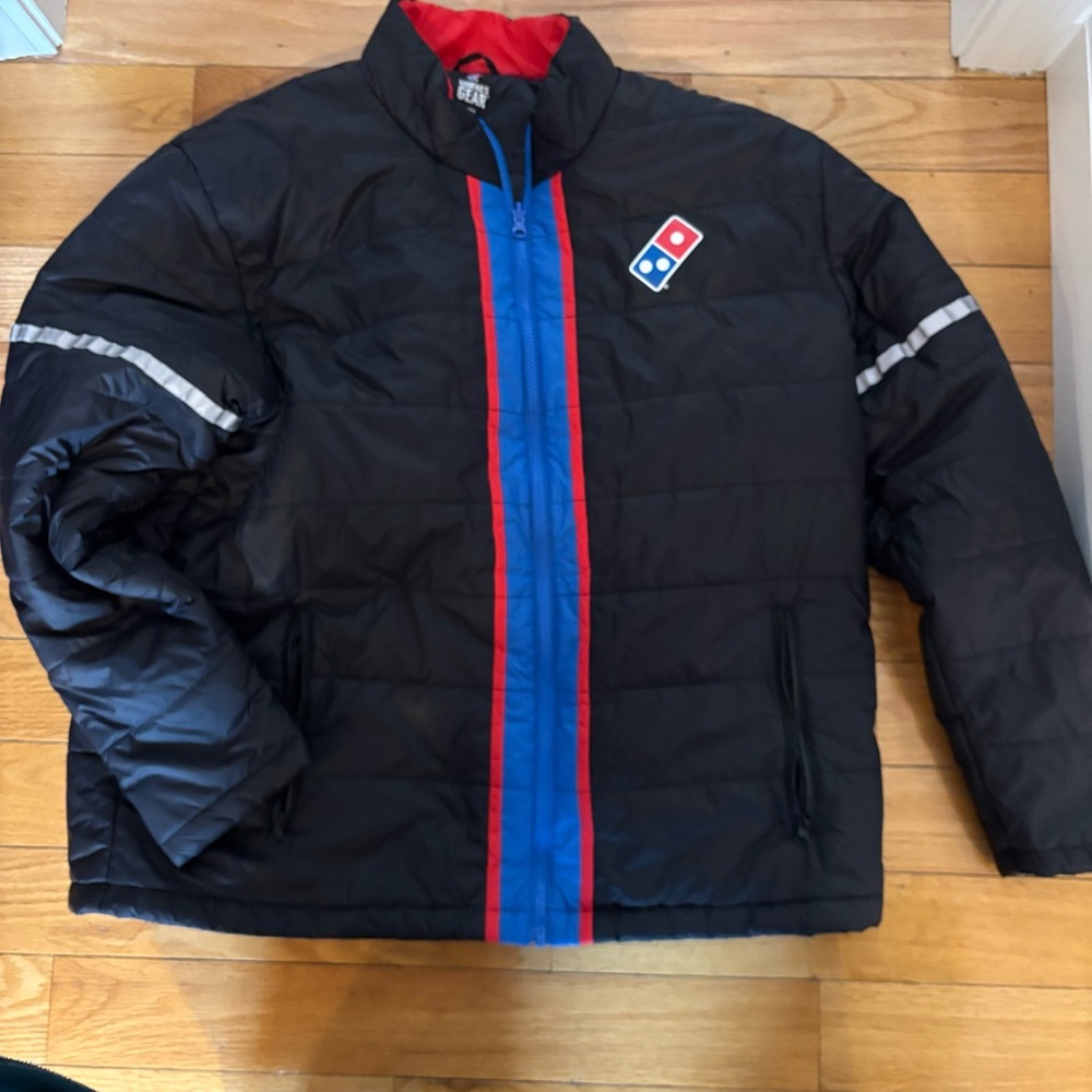 Dominos gear Men’s Black Puffer Jacket with Blue Center Stripe and Red Trim